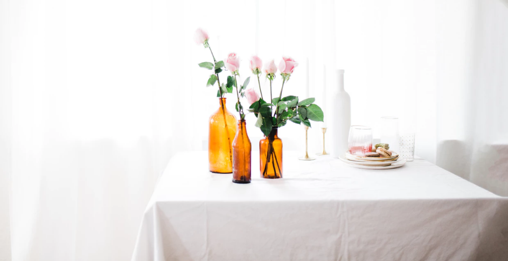 Three brown glass jars