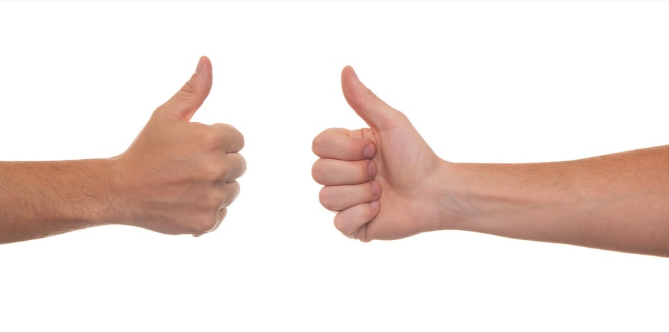 Two thumbs up facing each other